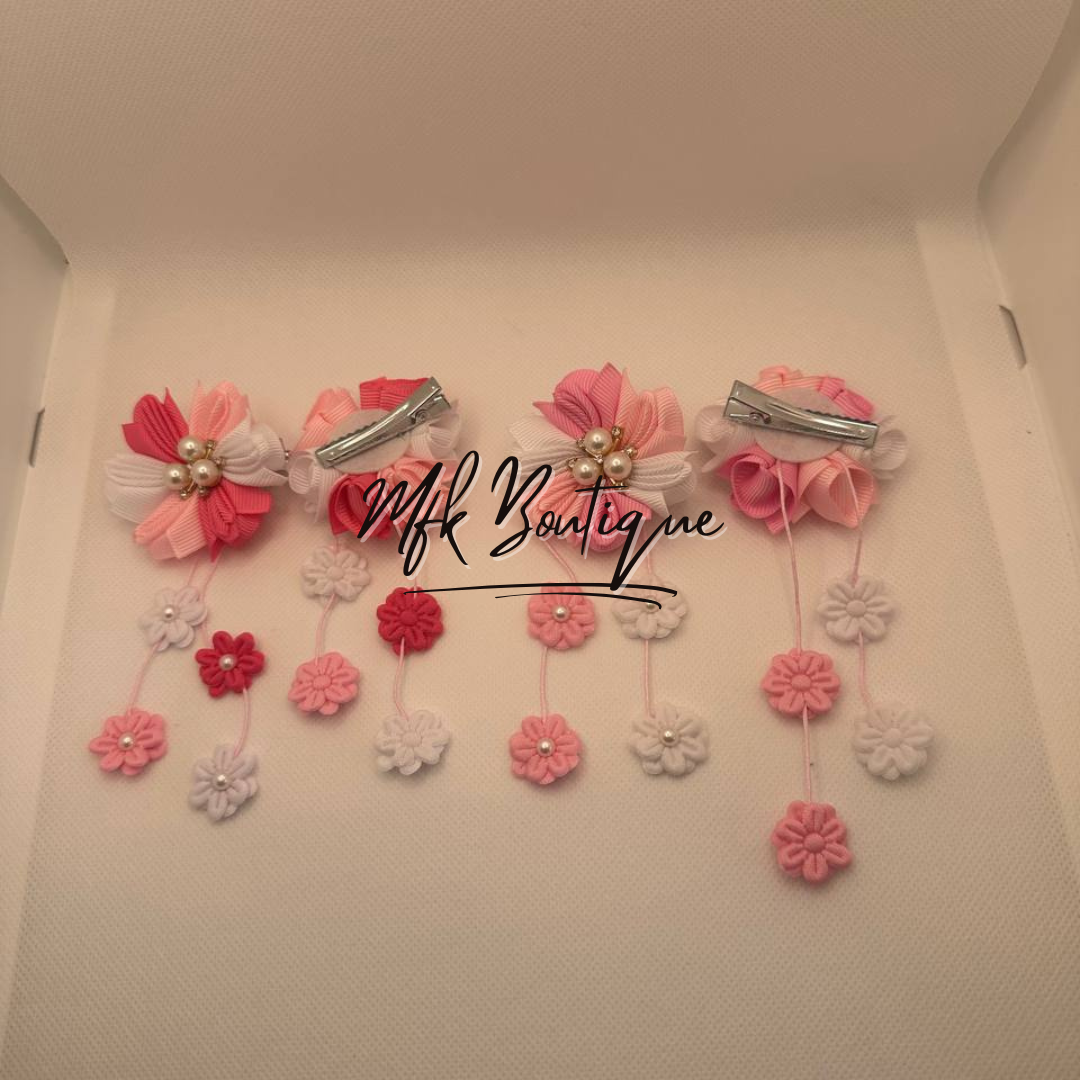 Pinces à cheveux à pompons floraux